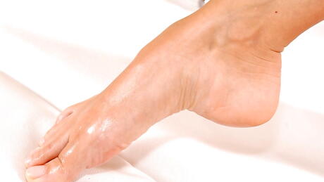 Very attractive redhead milf Veronica Da Souza in uniform makes some foot fetish 