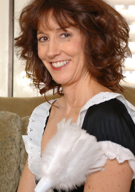 Stunning mature Erica Scott in uniform in nasty foot fetish 